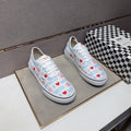 Vans White Graphic Low-Top Sneakers — front